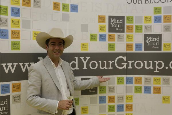 René at Mind Your Group, cowboy hat